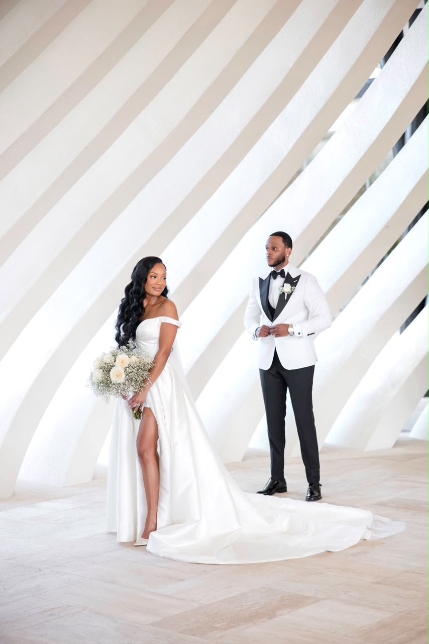 Bride and groom during a beachfront wedding ceremony in Riviera Maya